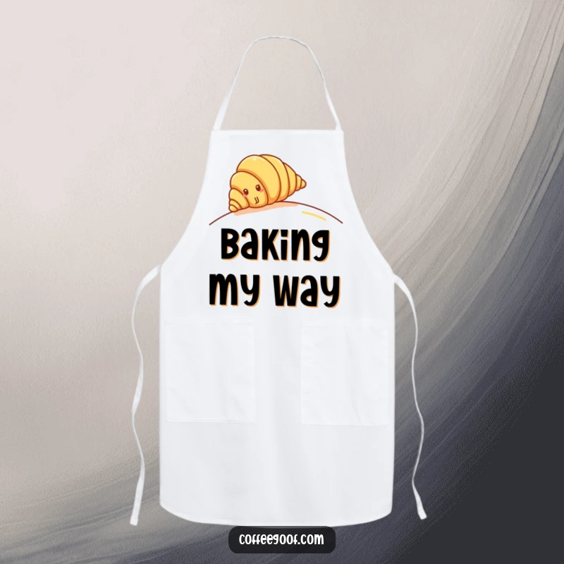 Funny Croissant Apron: Cheerful croissant character rolling down a gentle hill, perfect for kitchen fun and protecting clothes.