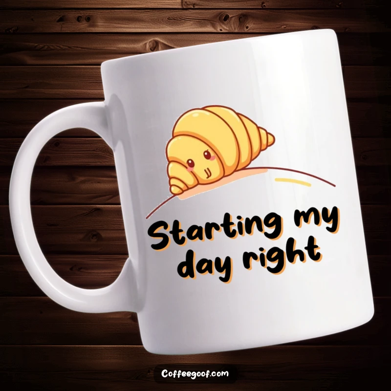 Funny Croissant Mug: Cheerful croissant character rolling down a gentle hill, perfect for pastry lovers and breakfast fun.