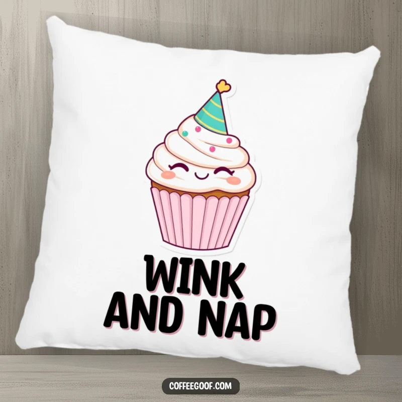 Funny winking cupcake pillow, with a party hat, offering a sweet, soft, and humorous decorative accent for any room.