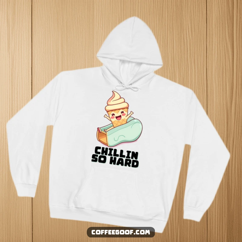 Funny hoodie graphic of a delighted anthropomorphic ice cream cone mid-slide, radiating pure, unadulterated fun.