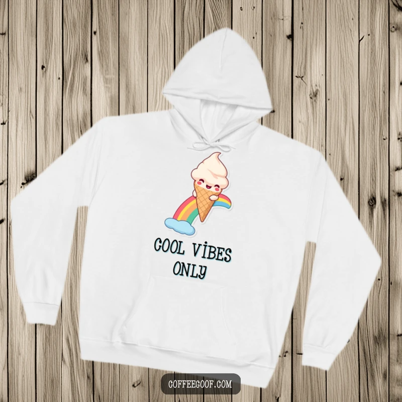 Funny Ice Cream Hoodie depicting a smiling anthropomorphic ice cream cone sliding down a rainbow, offering cozy sweetness and fun.