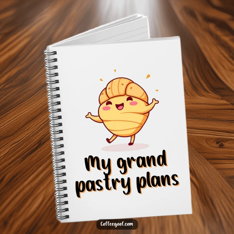 Funny notebook featuring a cheerful croissant with sprinkles mid-jig, ideal for capturing notes with a side of pastry-inspired happiness.