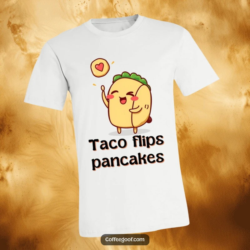 Funny winking taco character expertly flipping a small pancake on a comfortable t-shirt, a humorous food-themed design.
