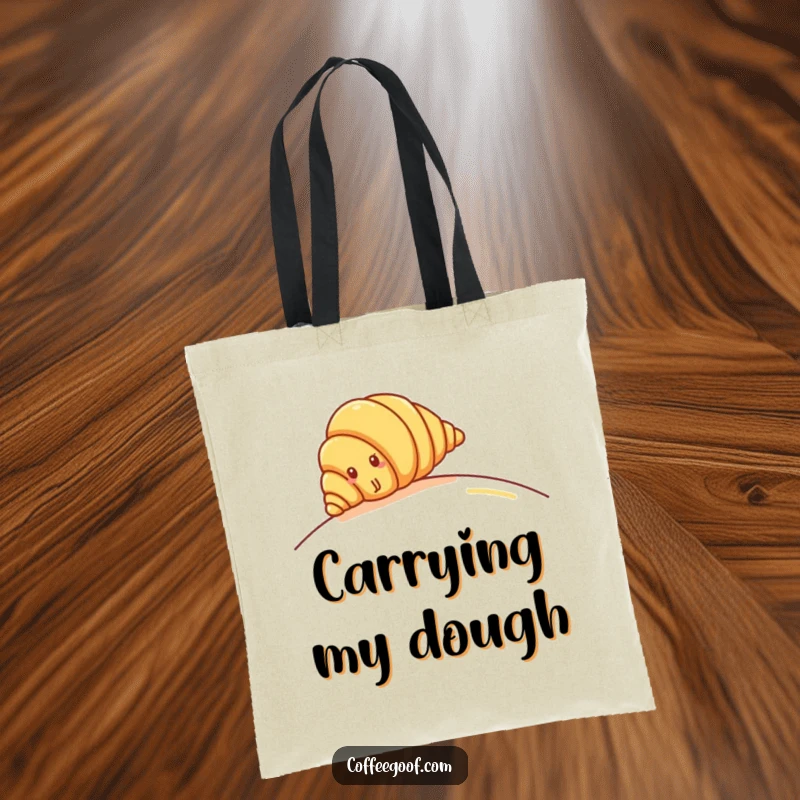 Funny Croissant Tote Bag: Cheerful croissant character rolling down a hill, perfect for carrying treats and joy.